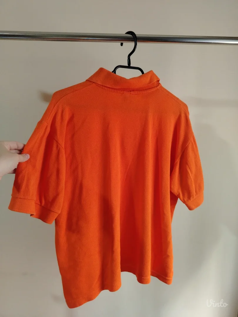 LACOSTE NARANDŽASTA MAJICA SA KRAGNICOM