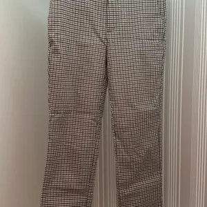 Stradivarius karirane pantalone, casual/formalnog stila