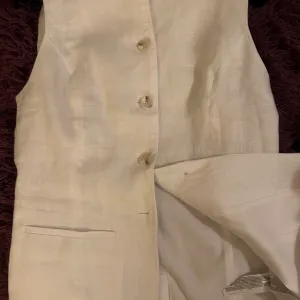 Primark laneni prsluk