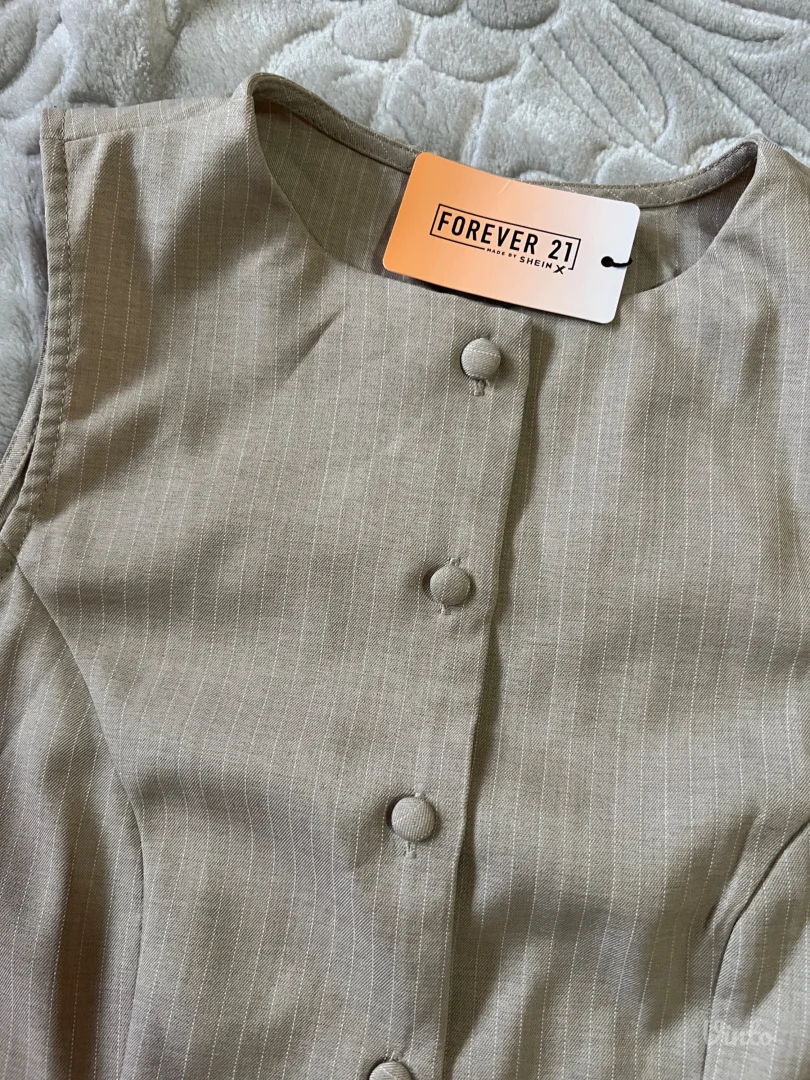 Ženski elegnantni prsluk