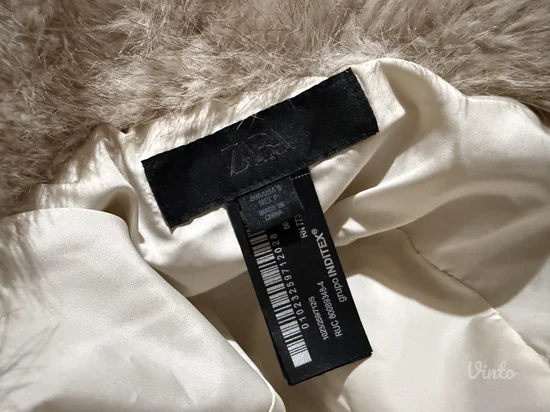 Zara bucket sheepskin kapa