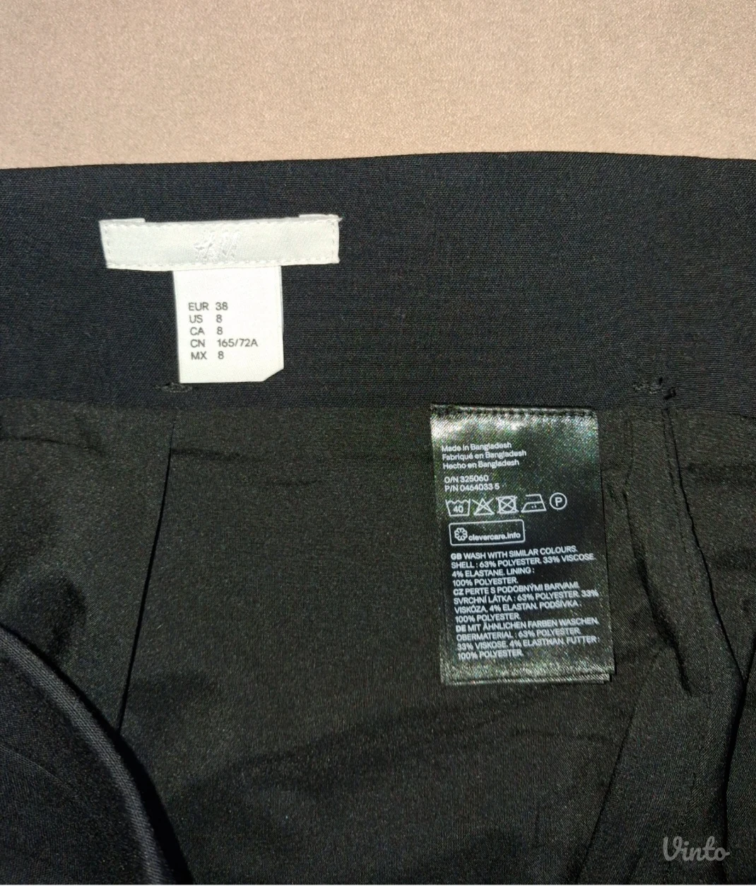 H&M crna poslovna suknja do kolena