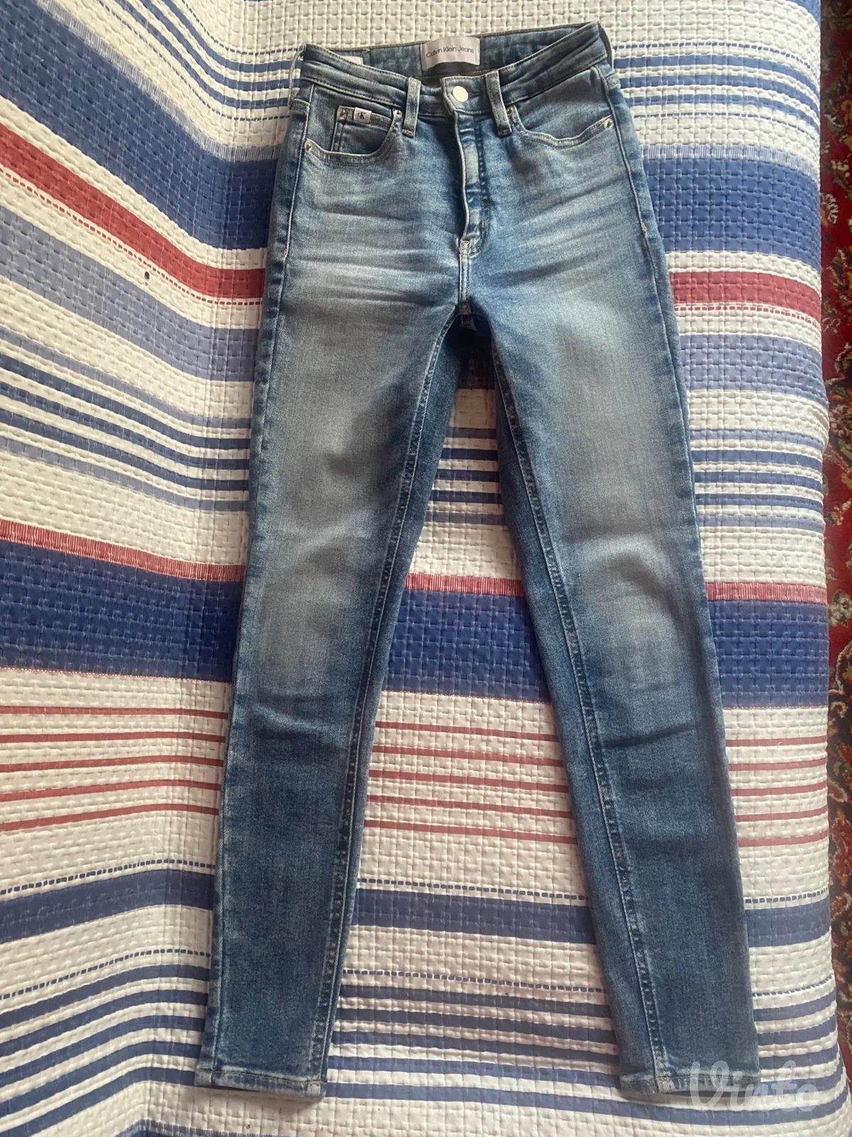Calvin Klein farmerice w 25