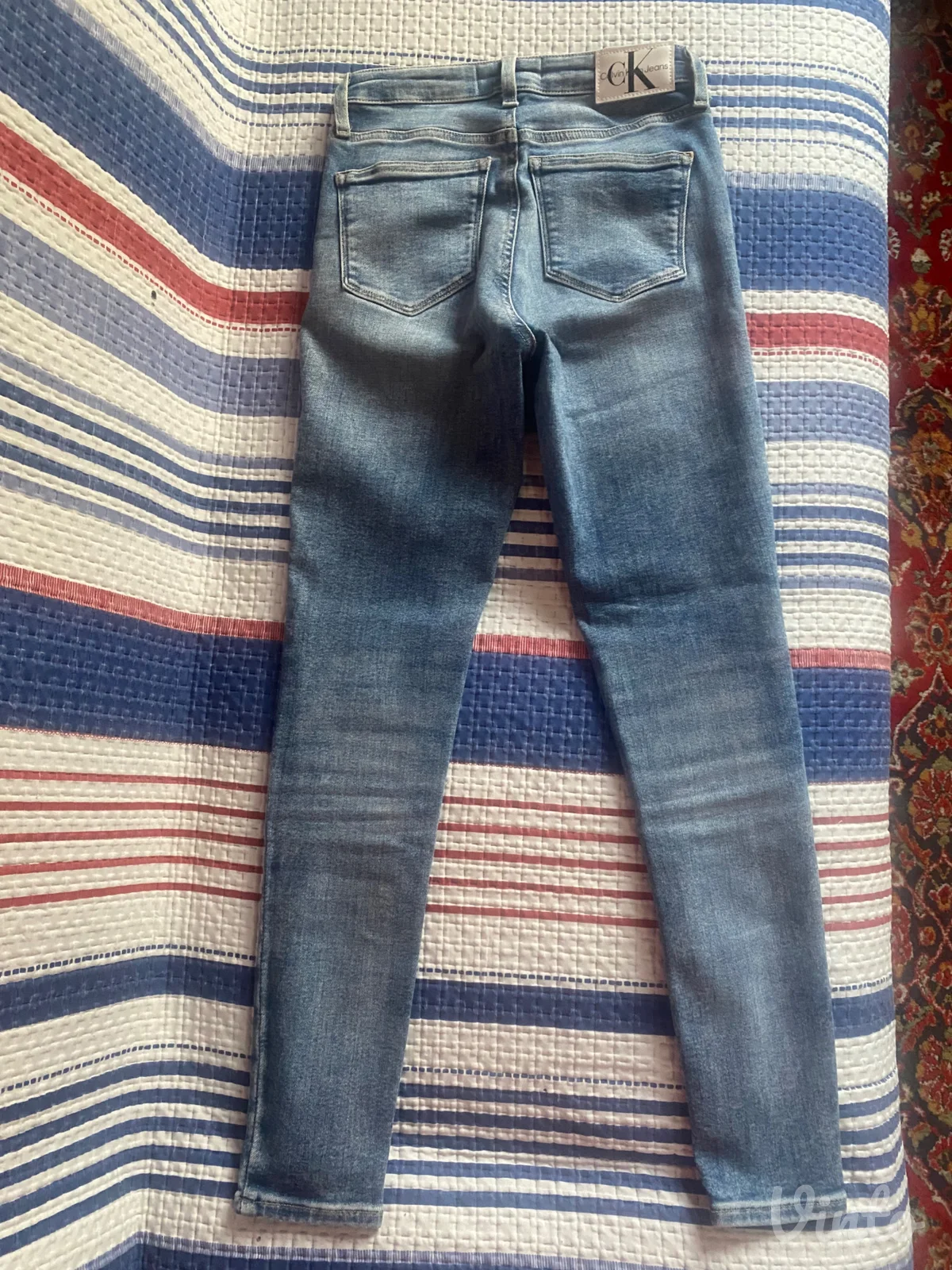 Calvin Klein farmerice w 25