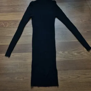 Trikotazna haljina polurolka S