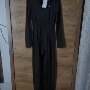 Crni kombinezon Hardlove M