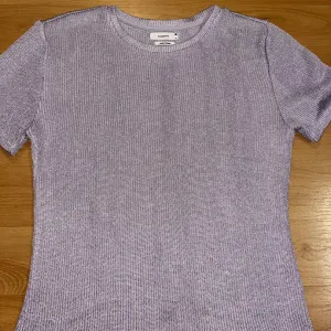 Reserved pletena lila majica