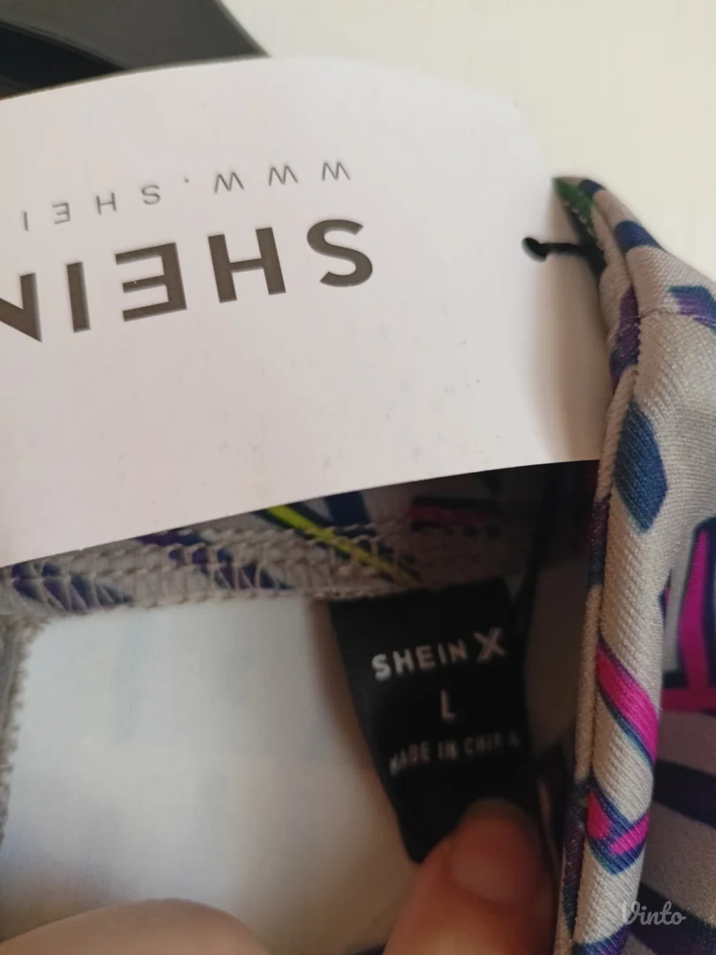 Nov, šareni kombinezon