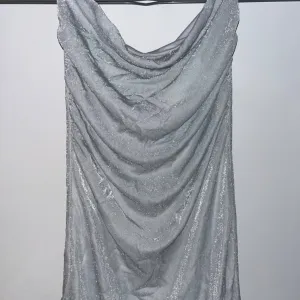 Reserved srebrna duga haljina - L