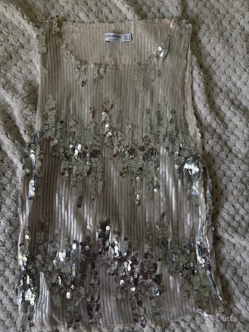 stradivarius sljokicavi top