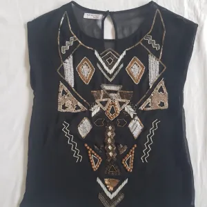 Suite Blanco bluza sa perlicama