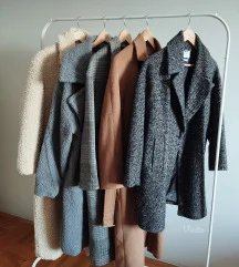 Kaput zenski, S vel, Reserved, kao novo