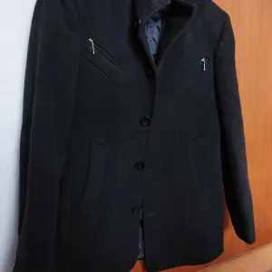 Crni kaput (E.Mussi)