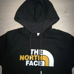 The North Face duks
