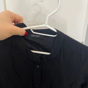 Haljina crna na duge rukave