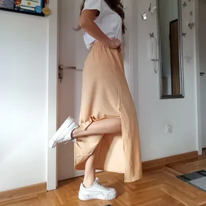 Žuta suknja sa rajsferšlusom