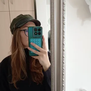 Maslinasto zelena kapa