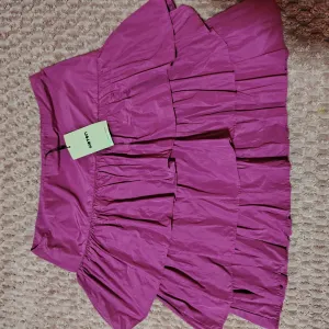 KOTON pink mini suknja sa karnerima – NOVO
