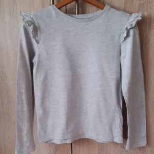 Siva bluza sa karnerima