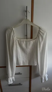 Elegantni lagani beli letnji top