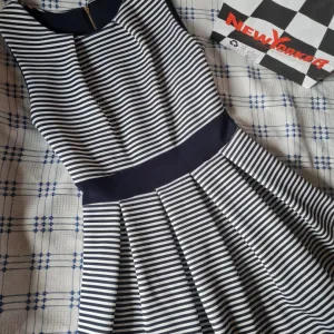 Nova prugasta haljina uni