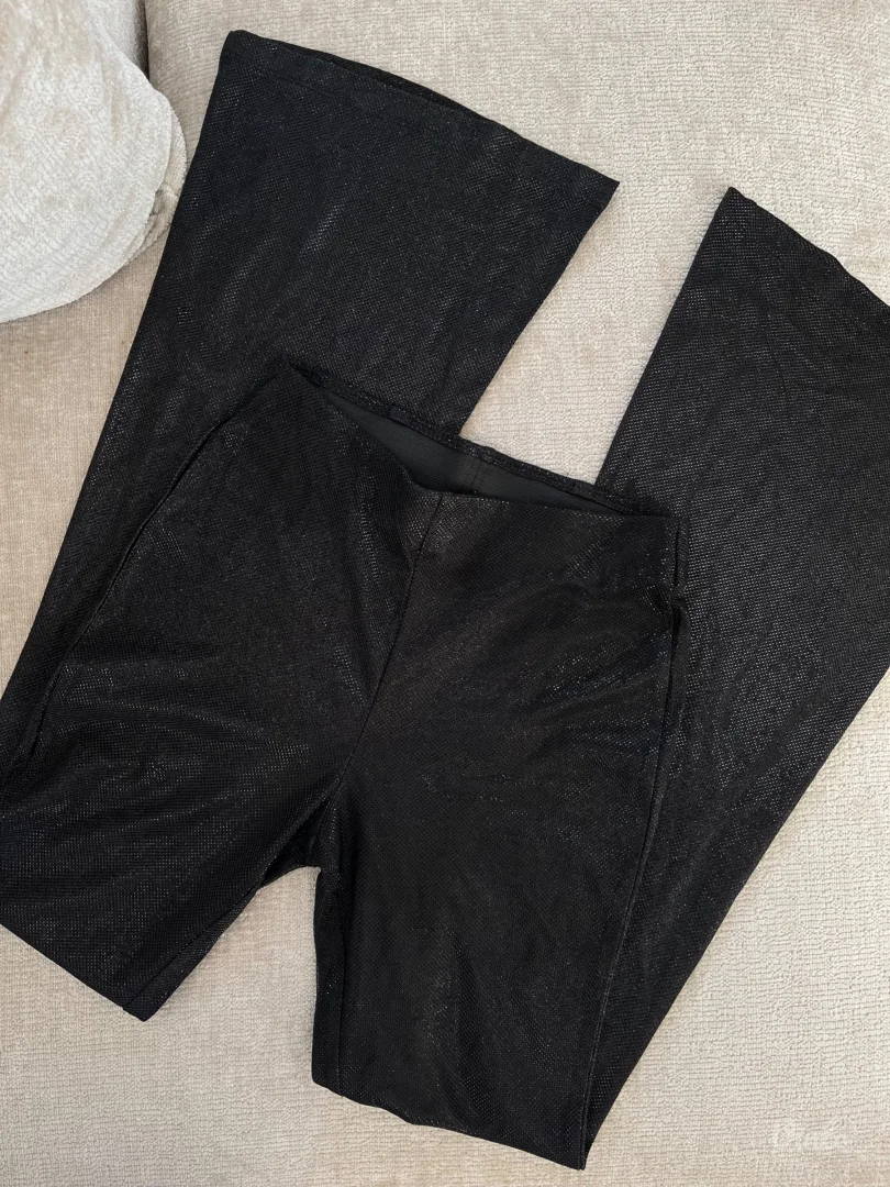 h&m svetlucave pantalone