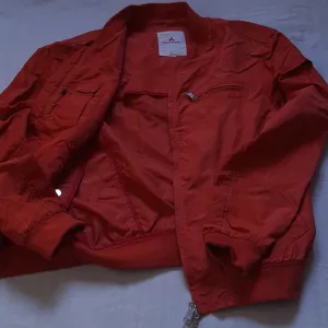 PEUTEREY muska vodootporna ,cigla boja ,jakna