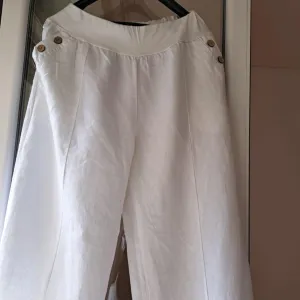 Bele lanene pantalone Puro Lino Italy,vel. L/XL, kao nove
