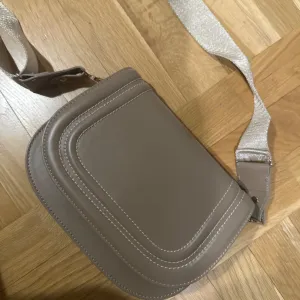 Dota bags-krem torba