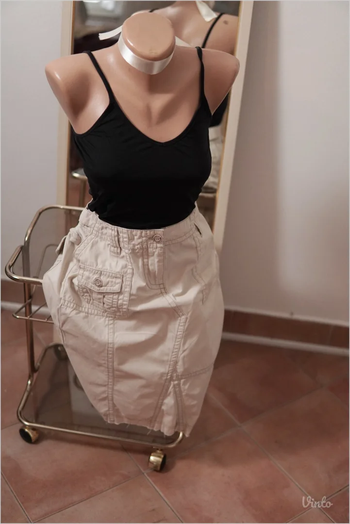 2.3.2. Esprit krem suknja M sa džepovima