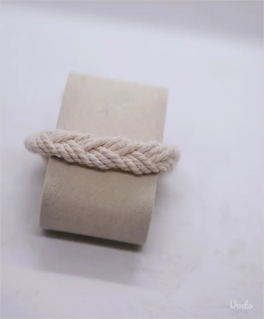 9.7. Muška krem pletena narukvica