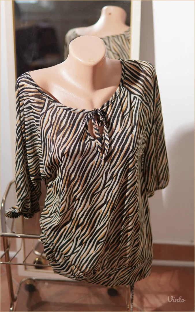 3.4. Animal print bluza Okay L