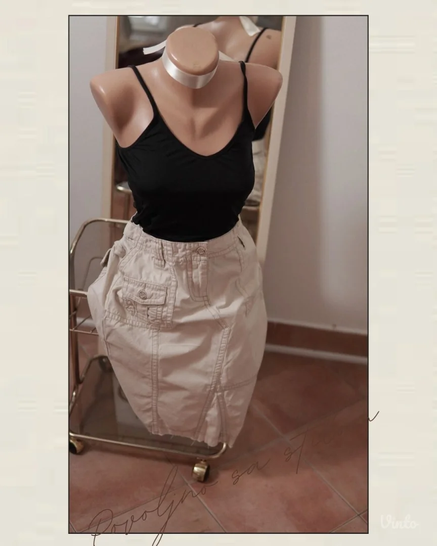 2.3.2. Esprit krem suknja M sa džepovima