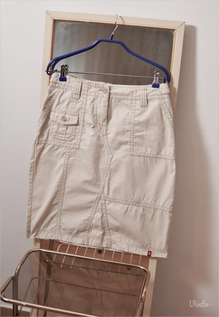 2.3.2. Esprit krem suknja M sa džepovima