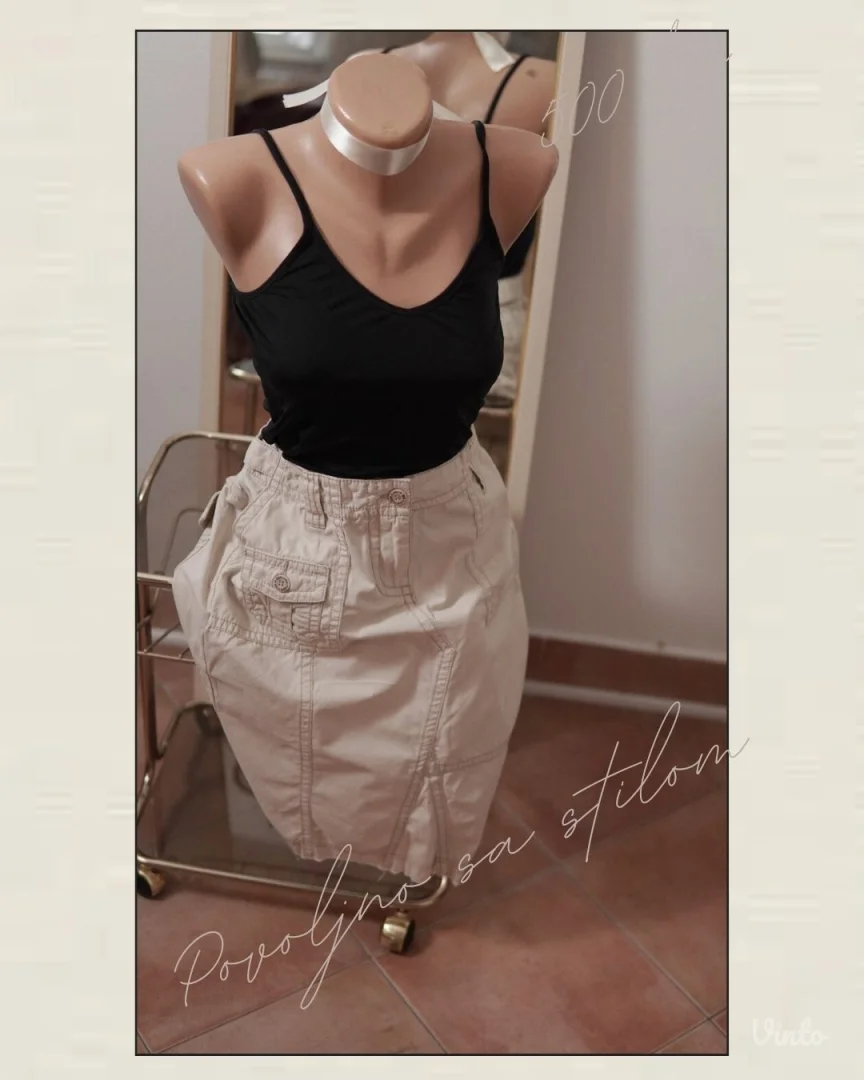 2.3.2. Esprit krem suknja M sa džepovima