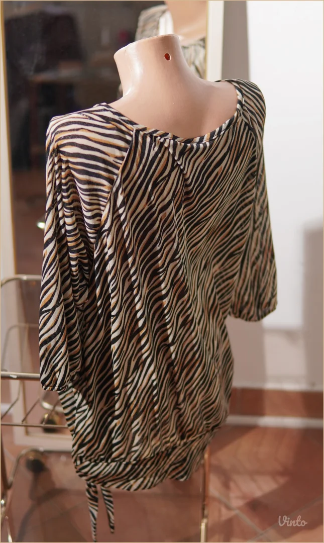 3.4. Animal print bluza Okay L