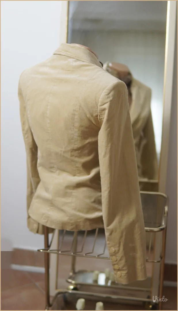 6.5. Hennes M bež sako