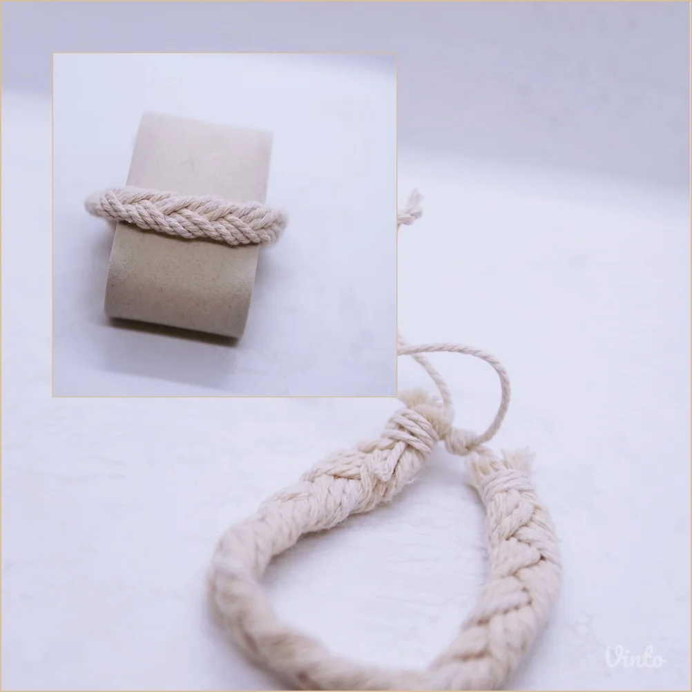 9.7. Muška krem pletena narukvica