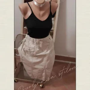 2.3.2. Esprit krem suknja M sa džepovima