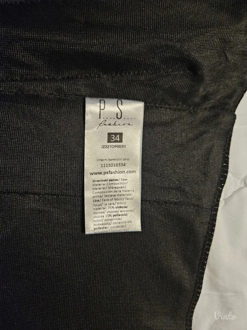 PS Fashion crni top sa etiketom