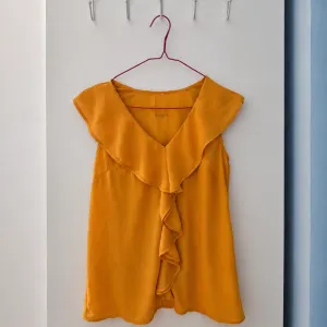 Tiffany žuta bluza sa karnerima