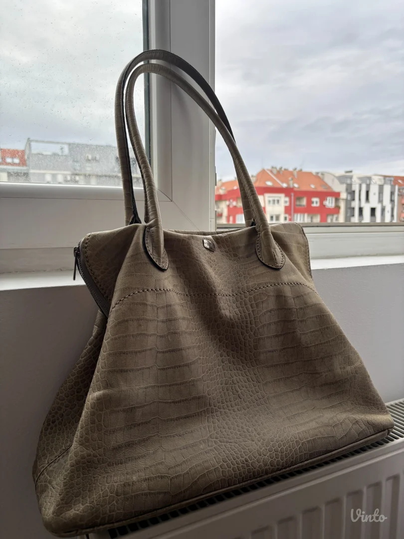 Manual očuvana kožna torba