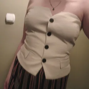 Krem poslovni top bez rukava