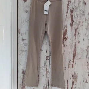 Zara krem pamučne helanke