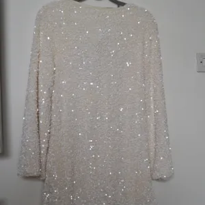 H&M bela haljina sa crnom mašnom vel 36