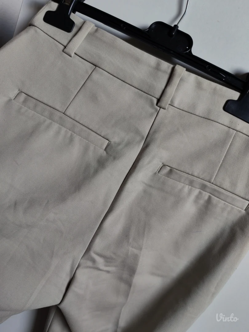 H&M svetlozelene strukirane pantalone