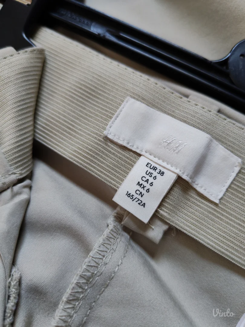 H&M svetlozelene strukirane pantalone