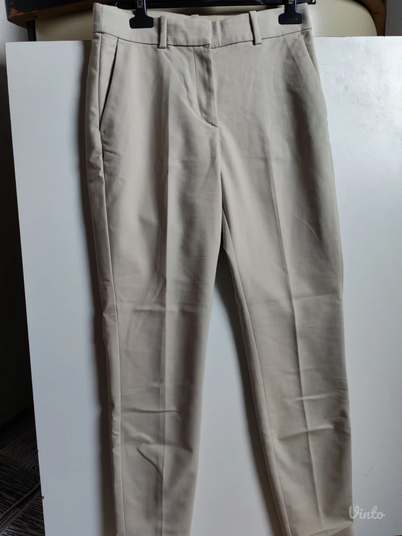 H&M svetlozelene strukirane pantalone