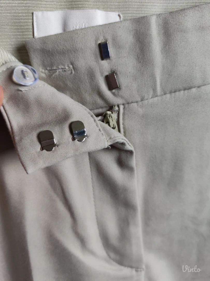 H&M svetlozelene strukirane pantalone