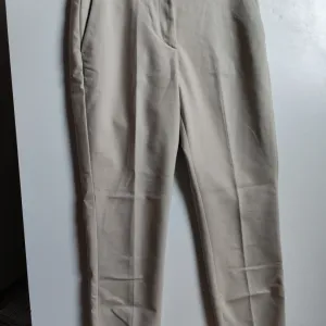 H&M svetlozelene strukirane pantalone